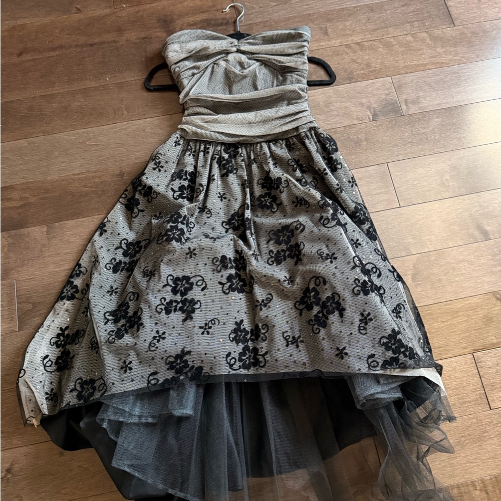 Elegant Strapless Dress with Black Floral Design